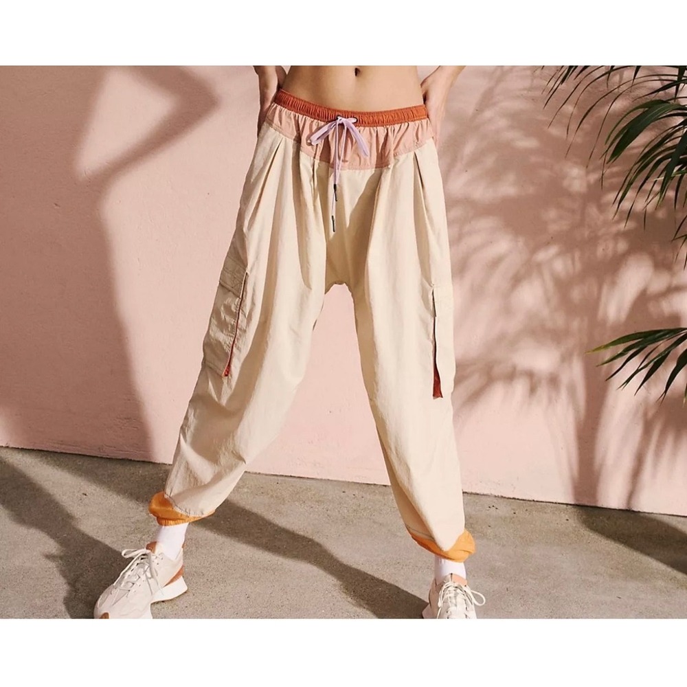 FP Movement by Free People Cream Track Joggers with Pink and Orange Accents